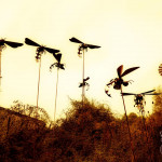 Rusty Creations metal hornet sculptures at sunset