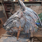 Side view of horseshoe horse head in progress