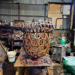 Horseshoe acorn sculpture progressing in the Rusty Creations workshop