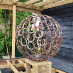Sphere 900mm in diameter on wooden plinth