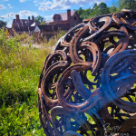 Individual horseshoes interlocked, close up of misfit sphere sculpture